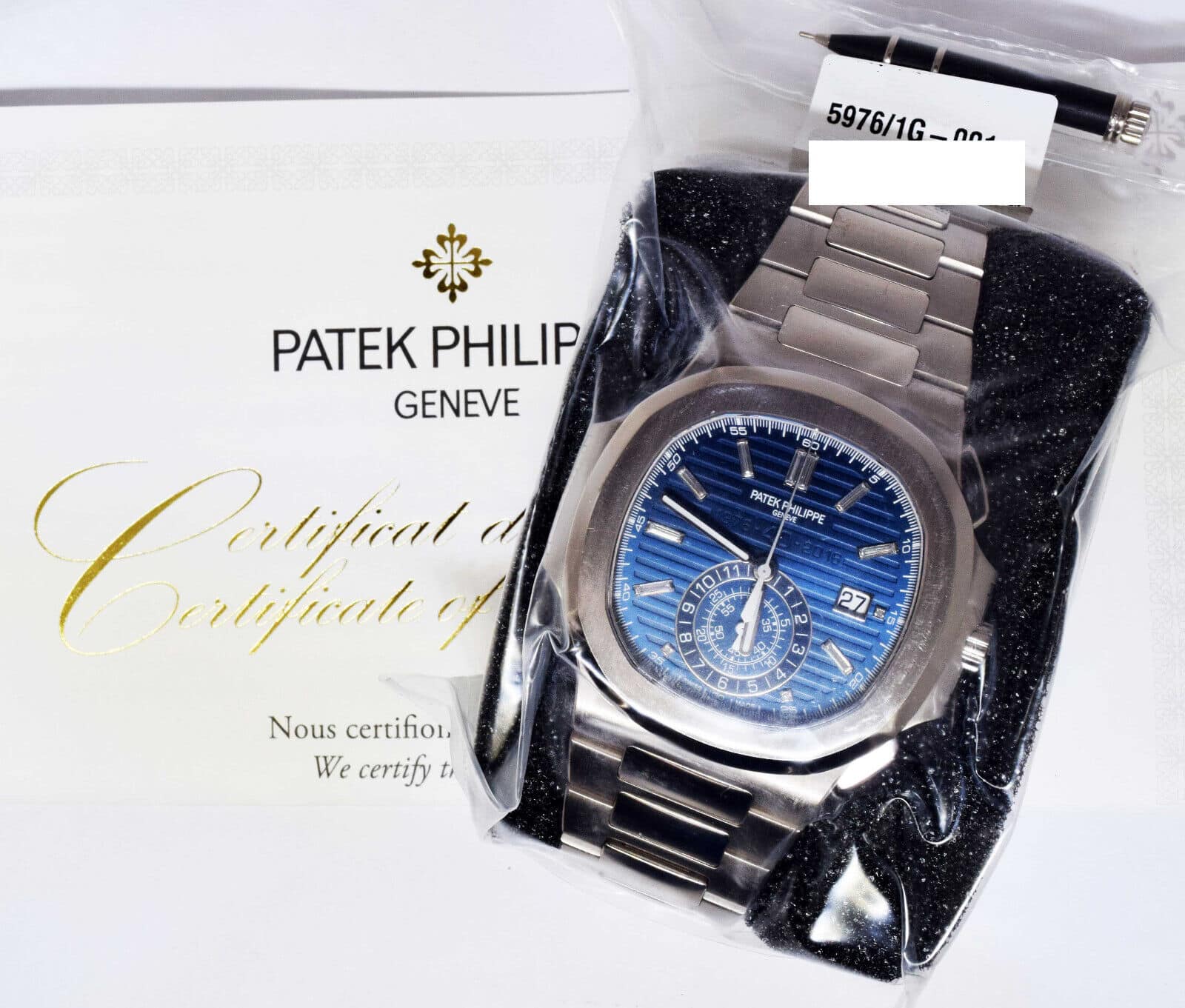 Patek Philippe Nautilus 5976/1G-001, 18K White Gold, Blue Index Dial 44 mm